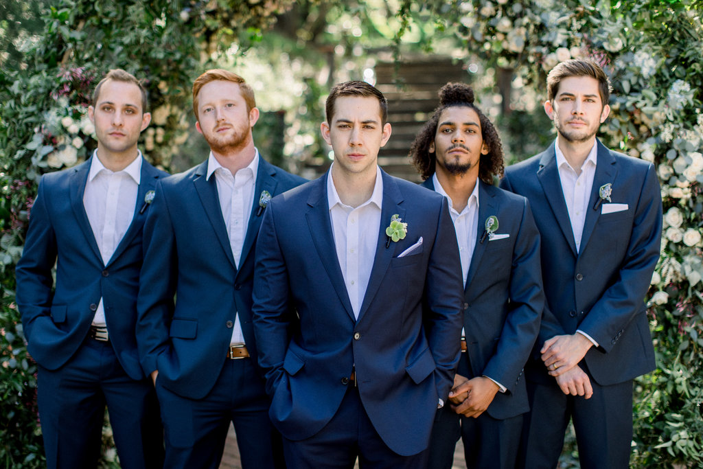 The groomsmen in navy