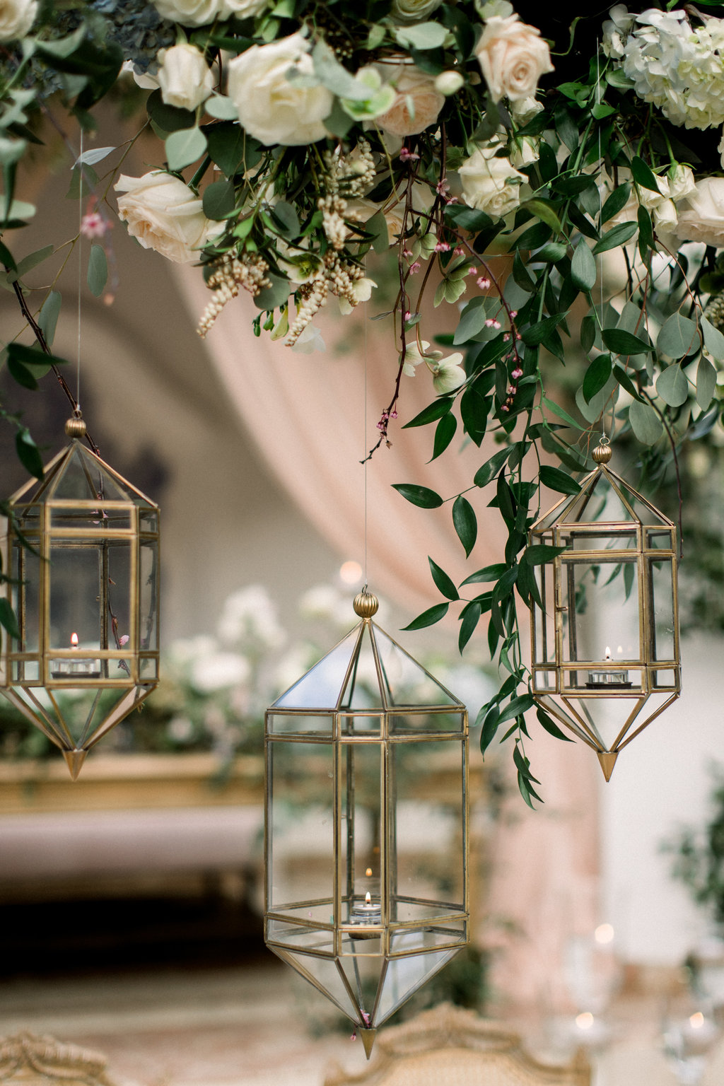 Lantern and blooms above the table