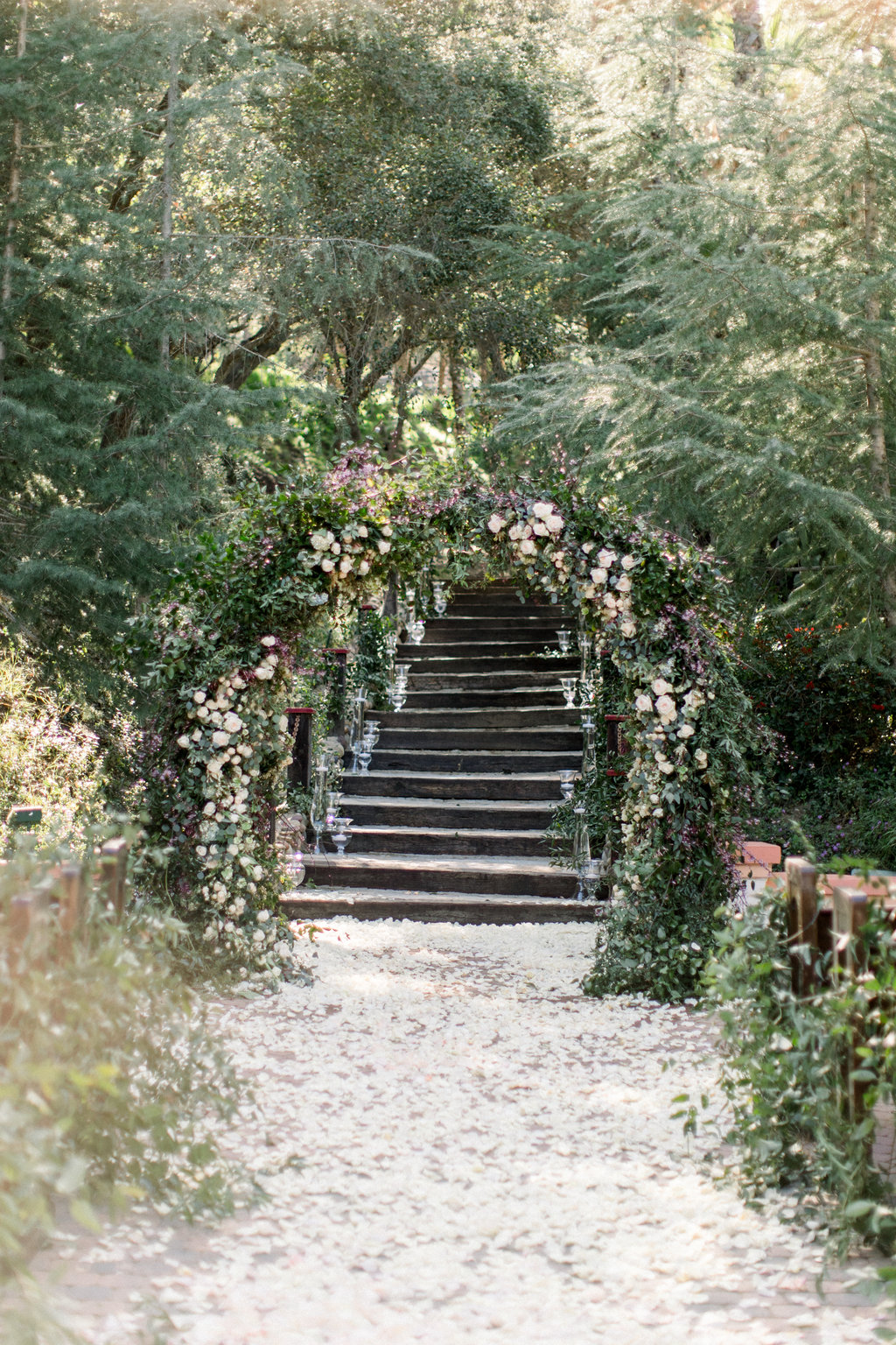 The ceremony aisle under the oaks