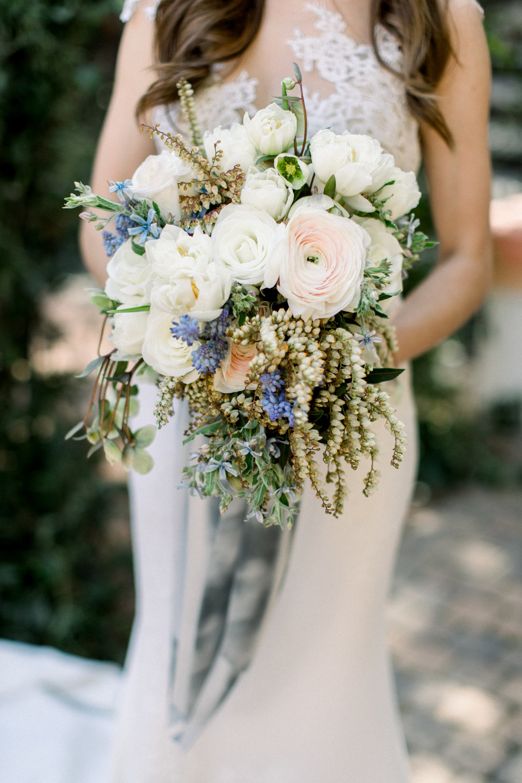 White garden roses and greenery
