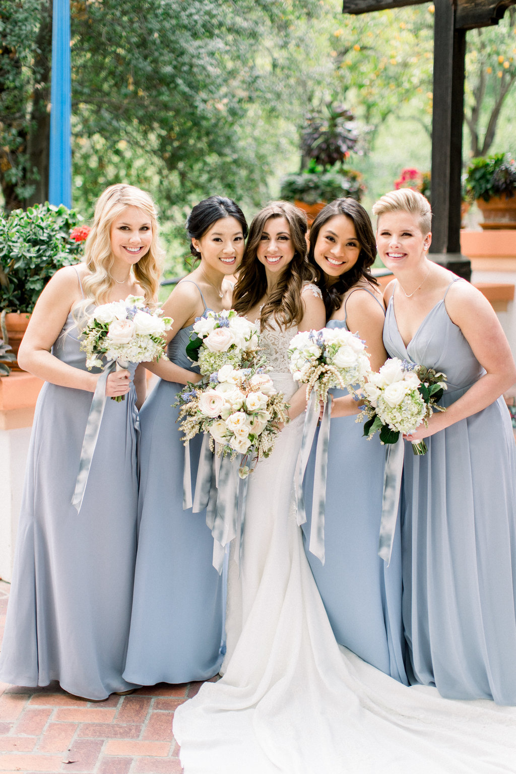 Bridesmaids in dusty blue at Rancho Las Lomas