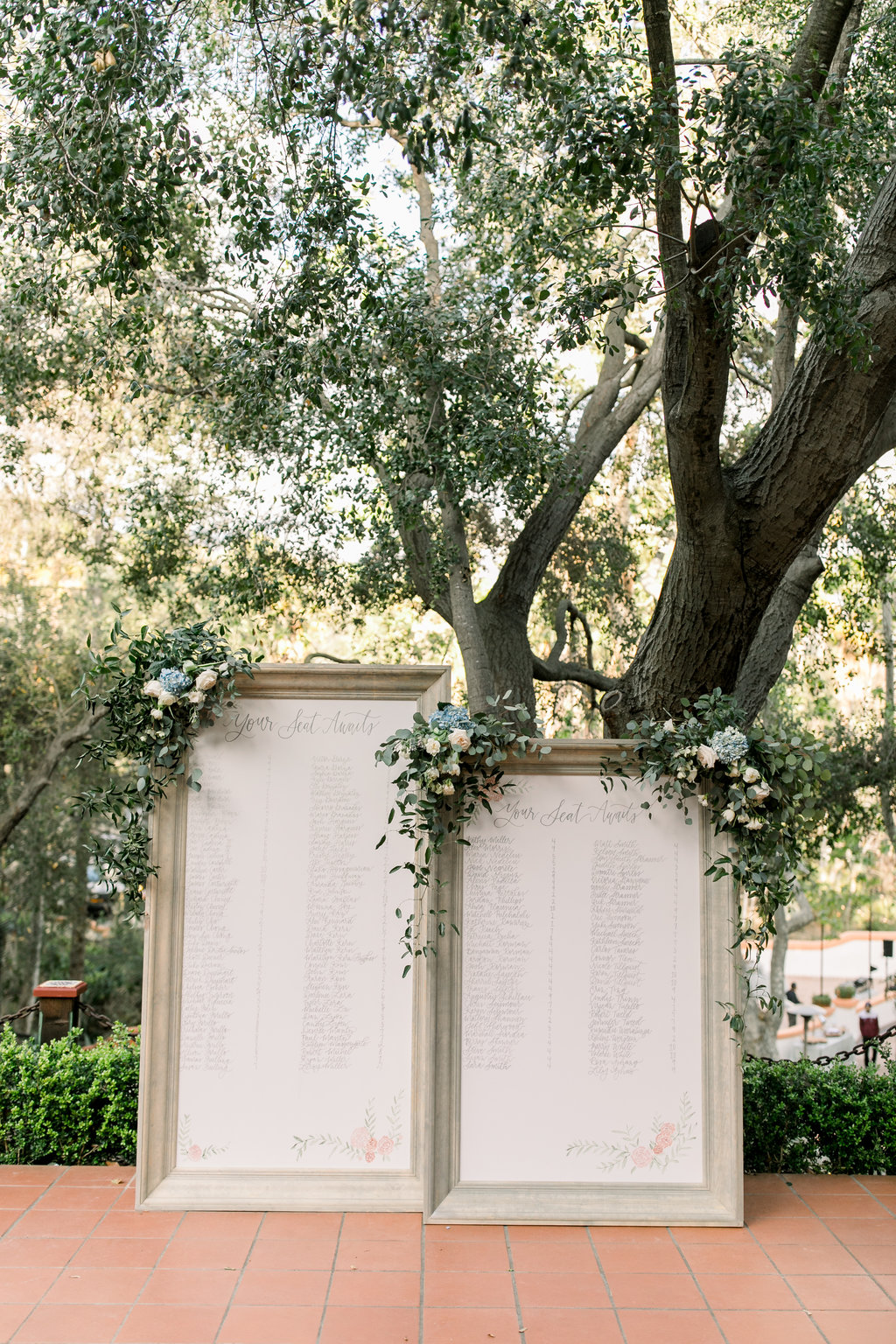 The seating chart framed in blooms