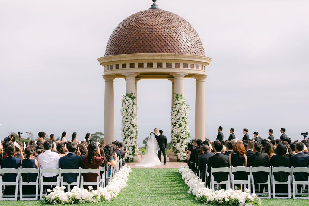 Vows in the rotunda at The Resort at Pelican Hill