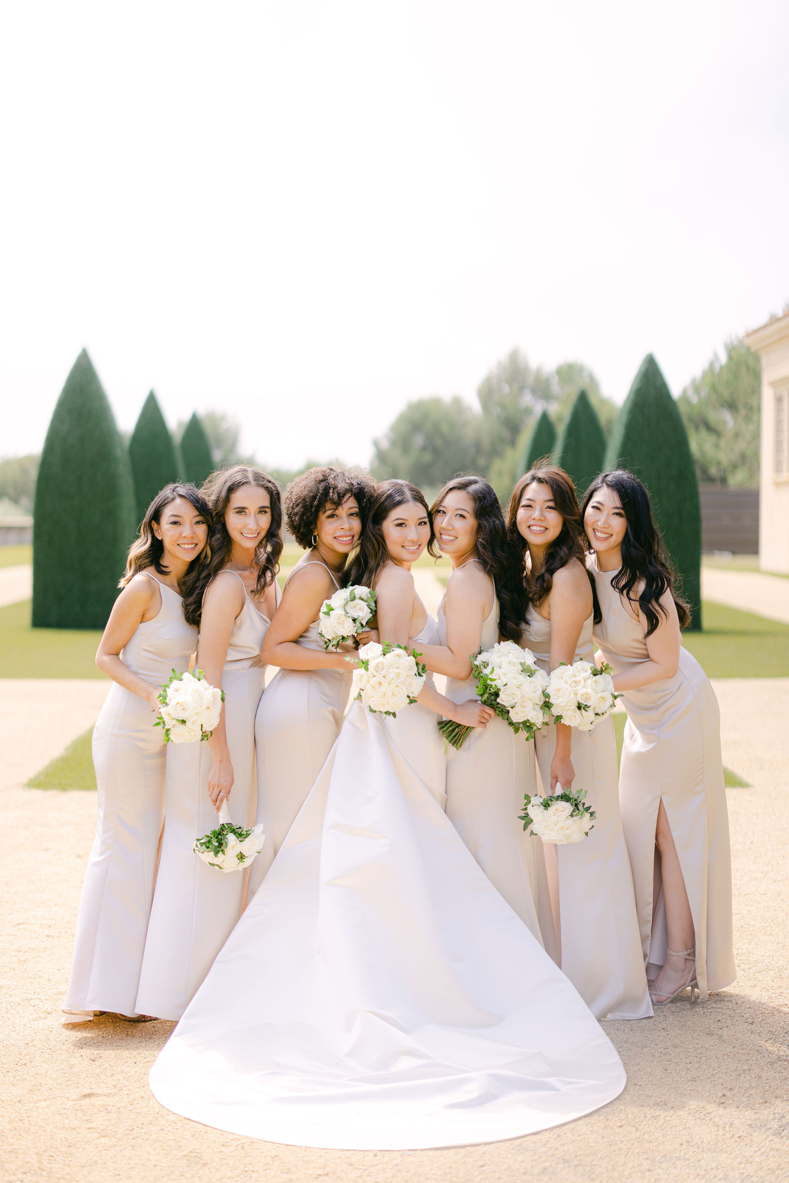Bridesmaids in champagne satin at Pelican Hill