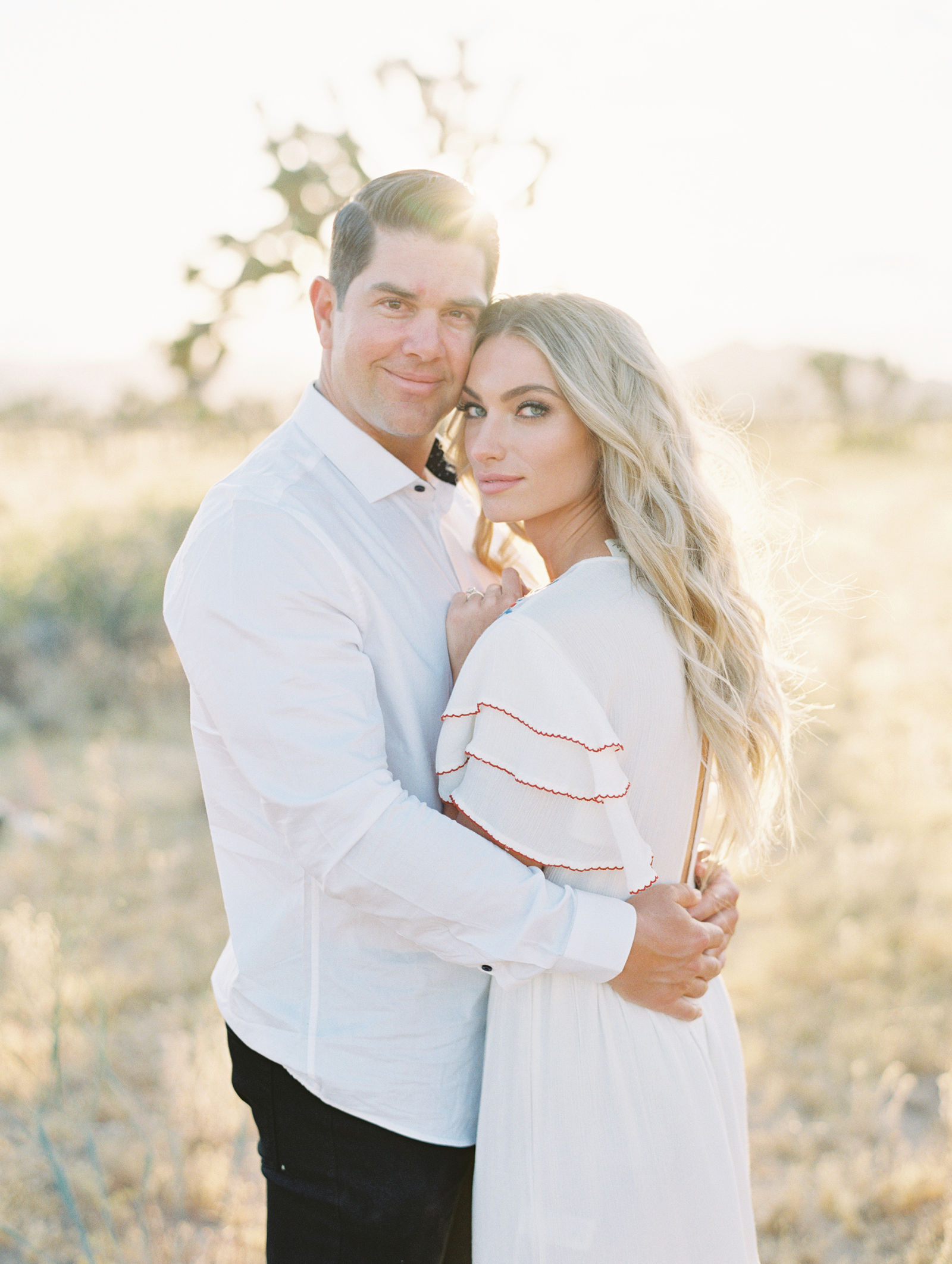 An embrace in warm desert light in Joshua Tree