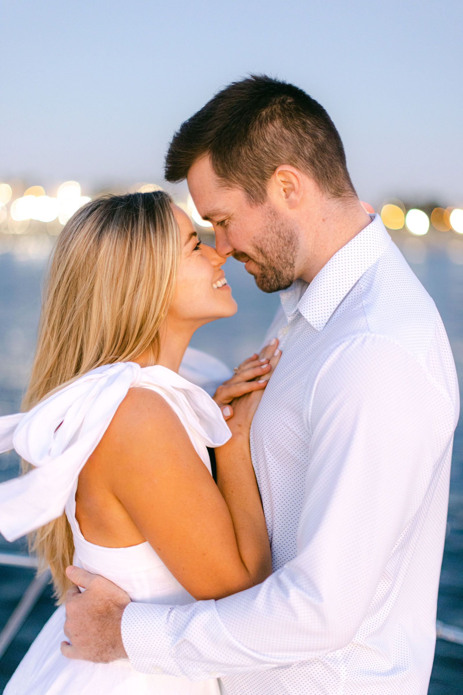 Nose to nose on the water at twilight