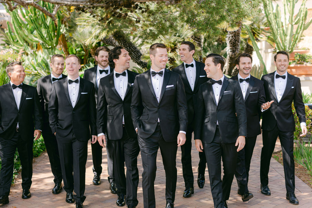 The groomsmen in black tie