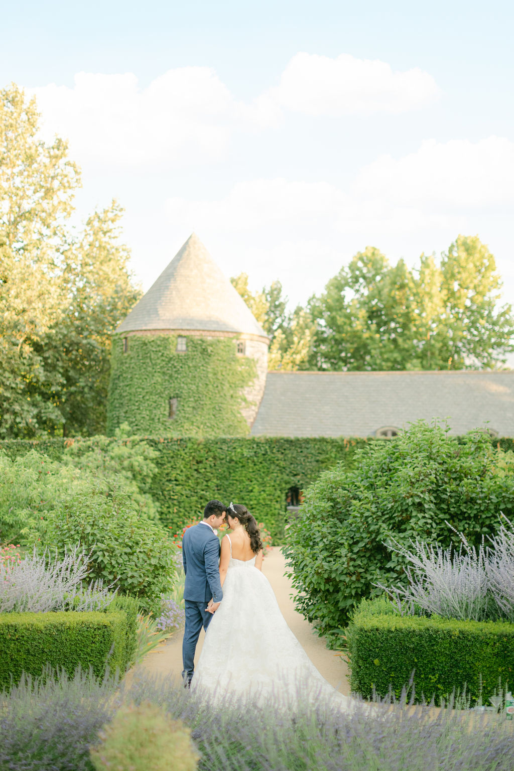 The turret at Kestrel Park rising over clipped hedges in Santa Ynez