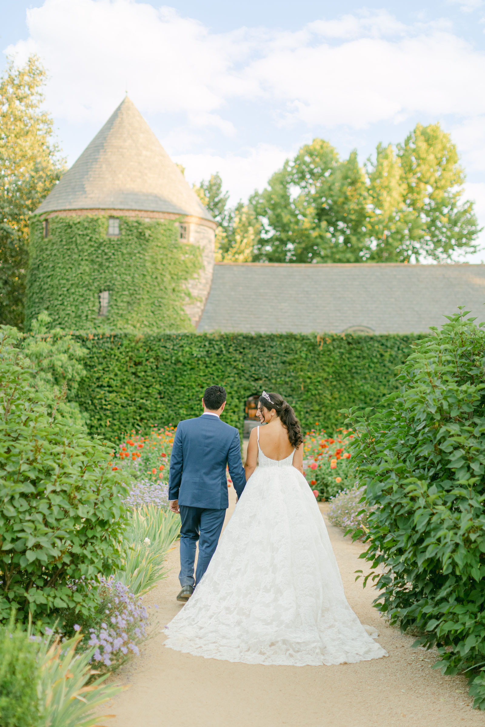 Walking the garden path to the stone tower at Kestrel Park