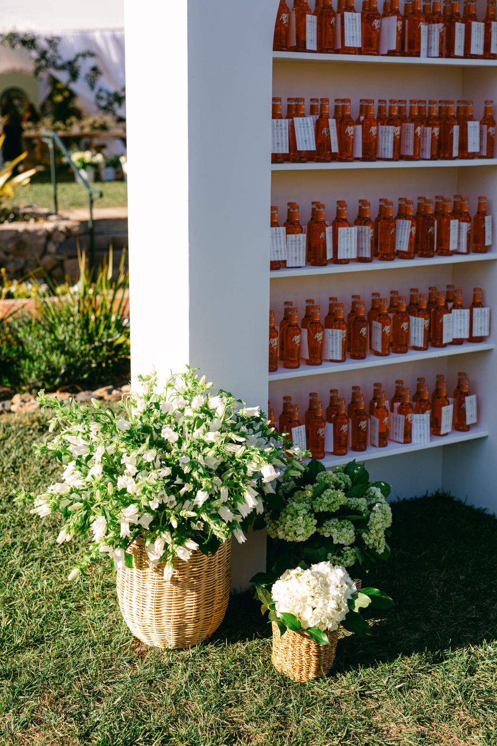 The bar, rose bottles lined up for cocktail hour
