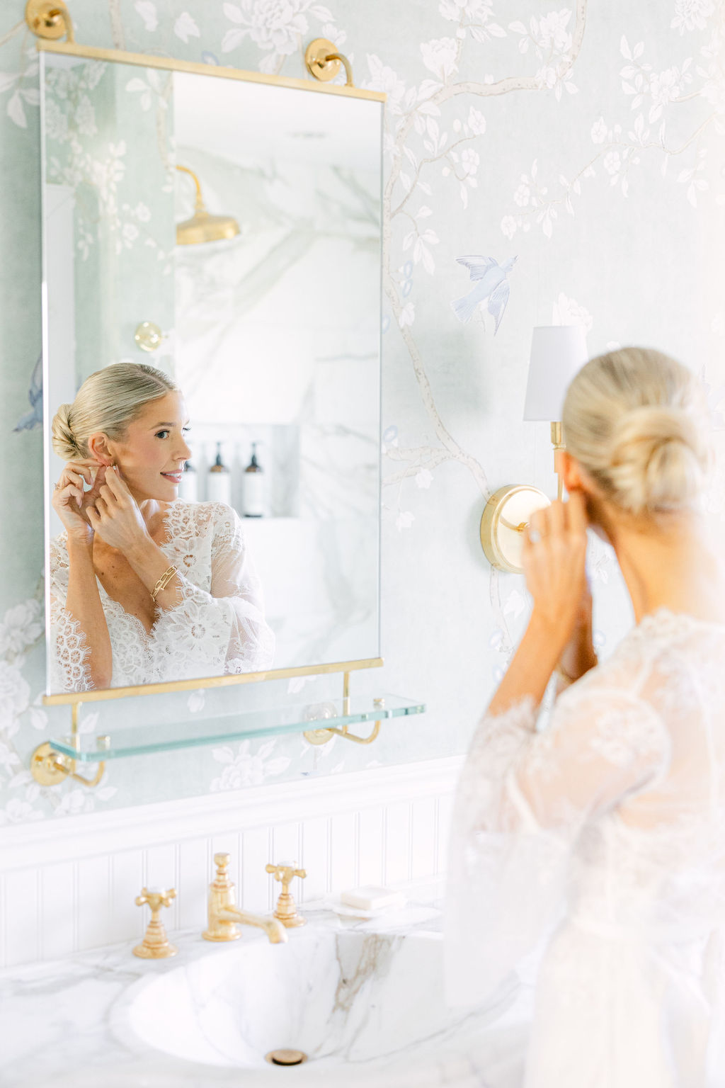 The last earring going in, mirror light at the Inn at Rancho Santa Fe