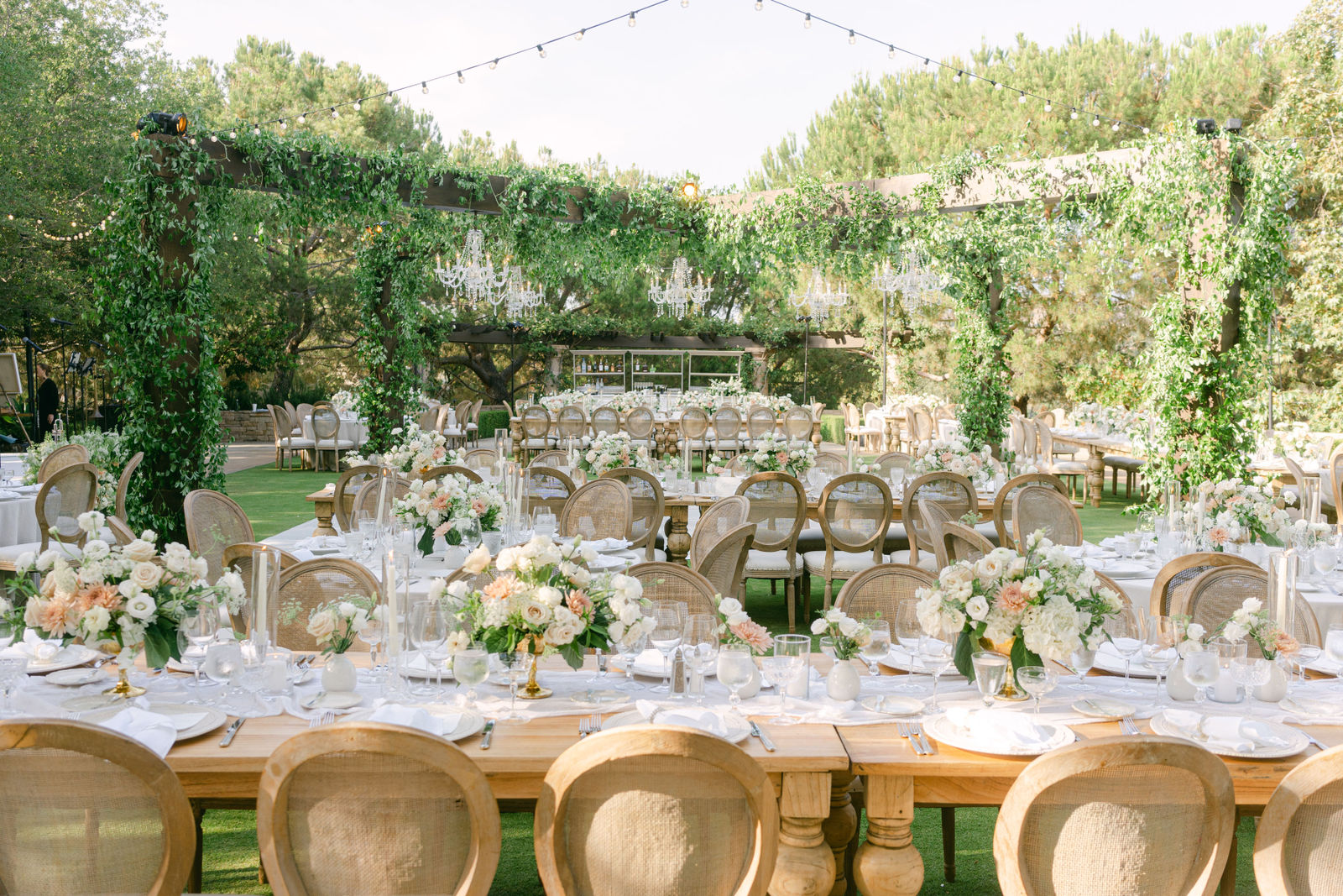 Florals and candlelight down the reception table