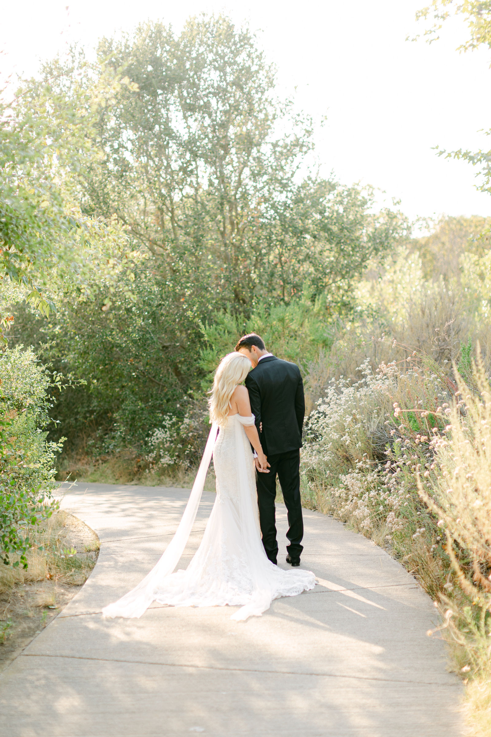 Shayna and Chance together on the path after the ceremony