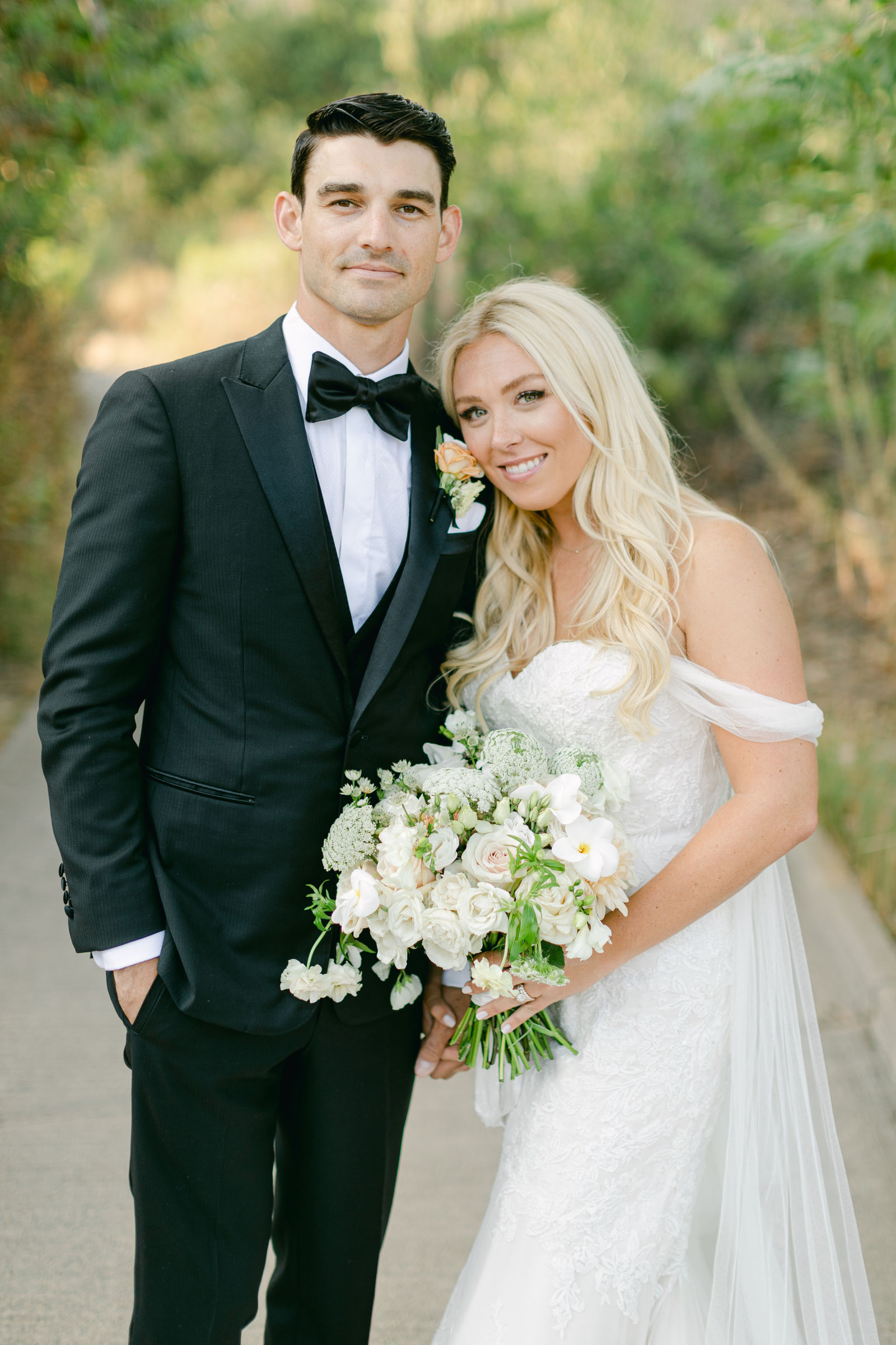 Shayna and Chance together on the path after the ceremony
