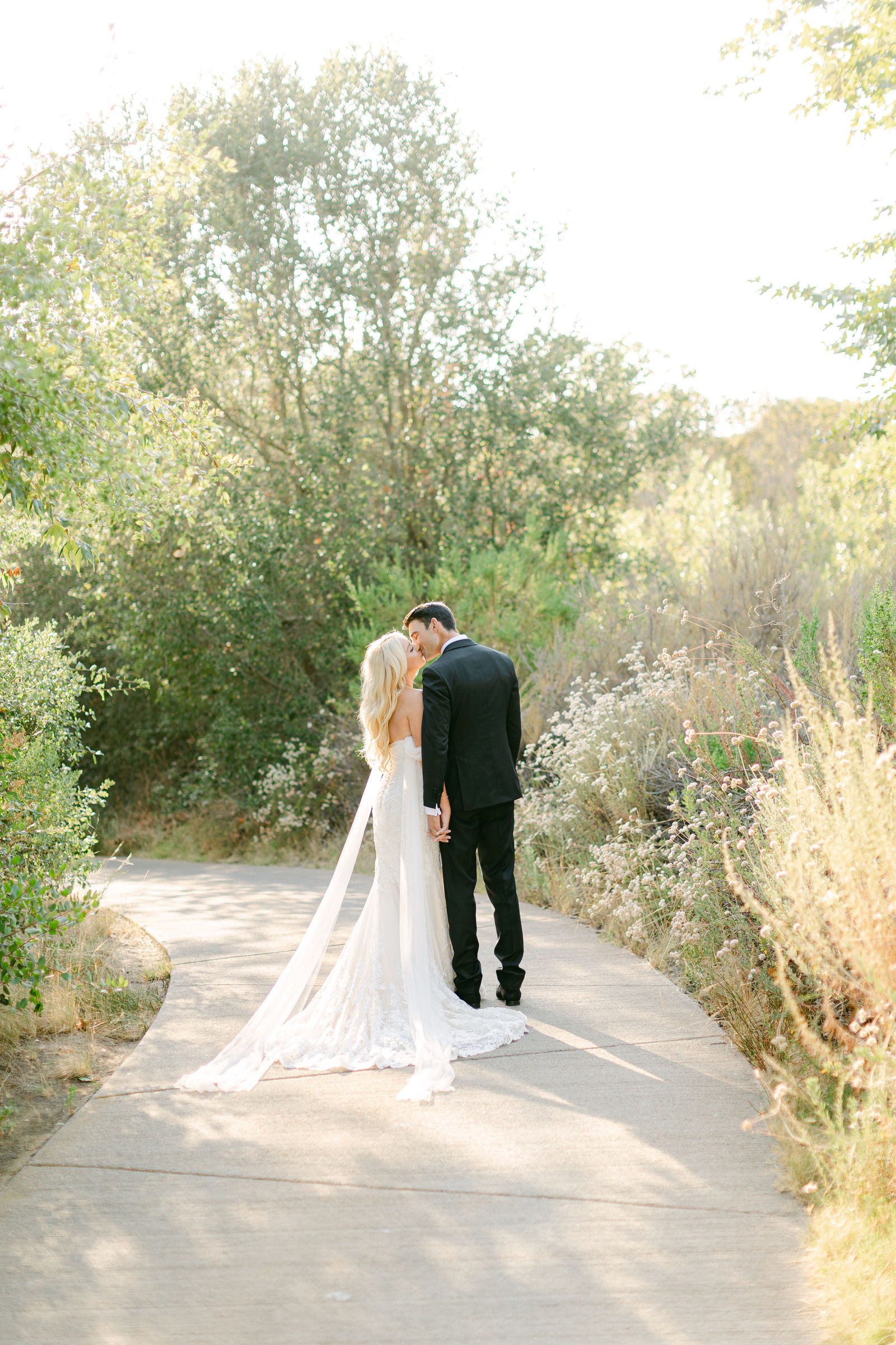 Shayna and Chance together on the path after the ceremony