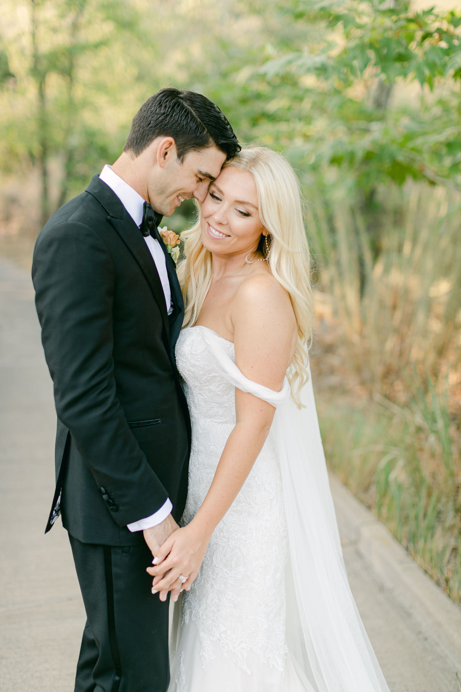 Shayna and Chance together on the path after the ceremony