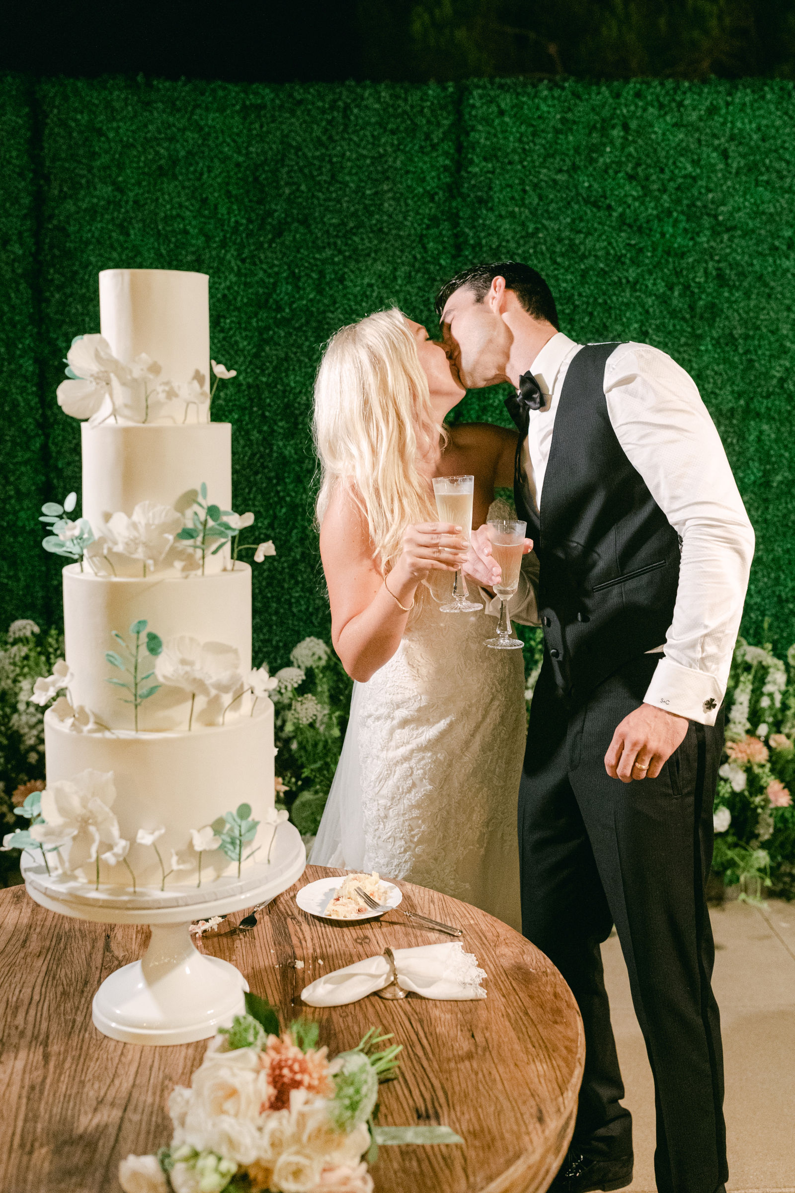 Cutting the cake, garden roses down the tiers