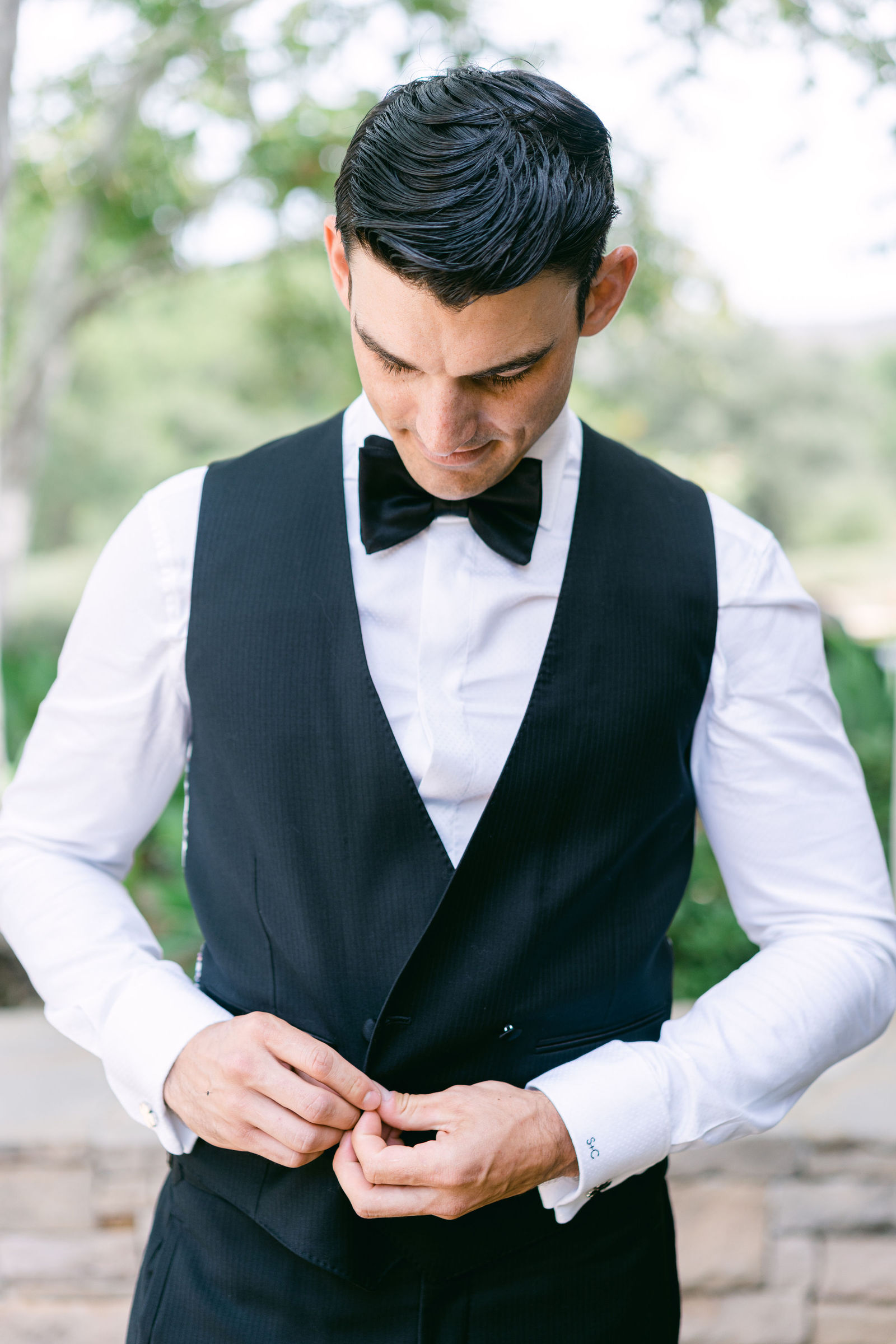 The groomsmen in black tie