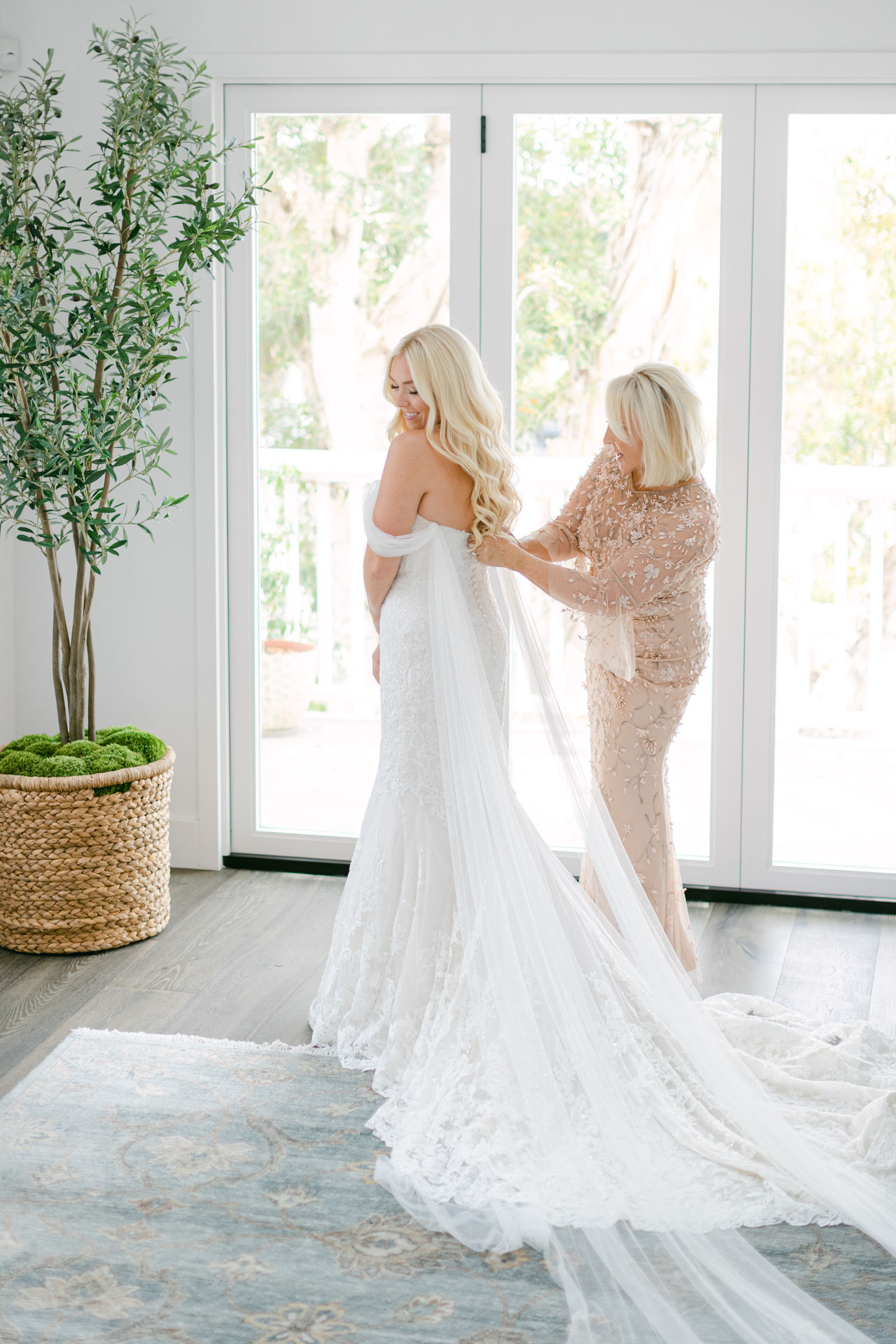 Getting into the gown, the train laid out across the floor