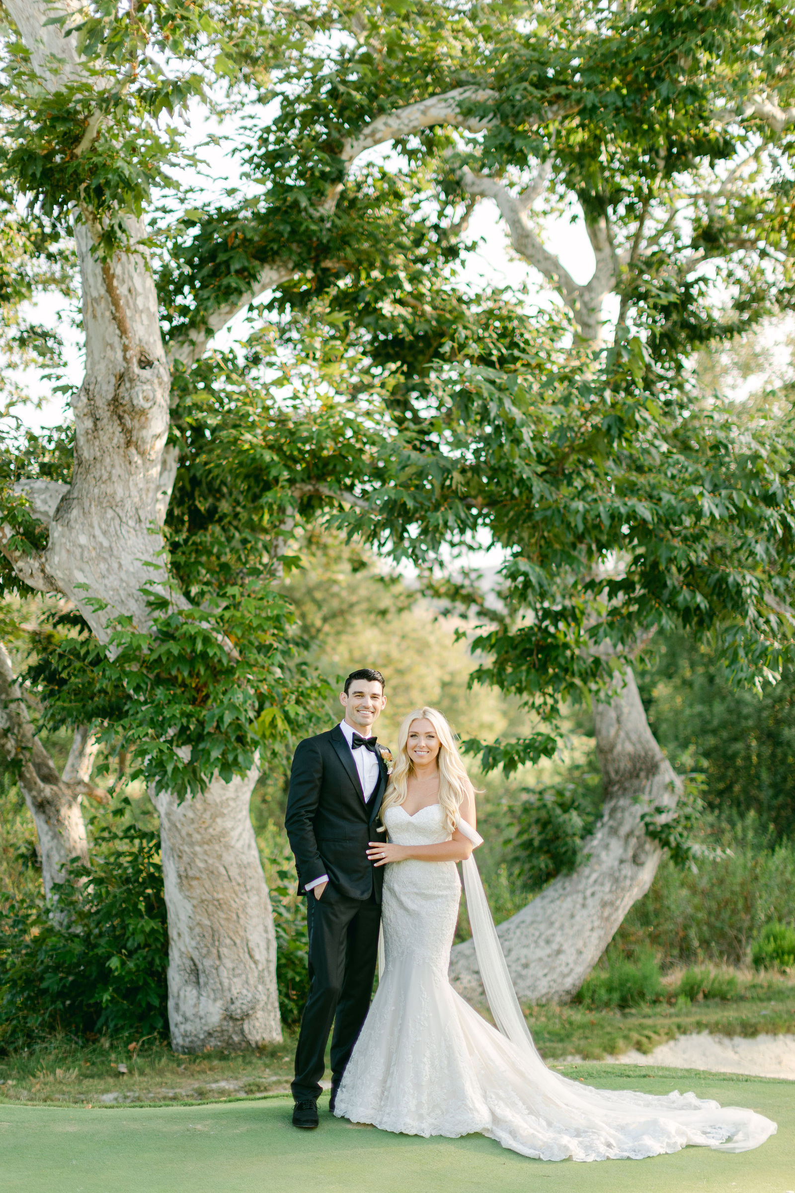 The two of them beneath the sycamores