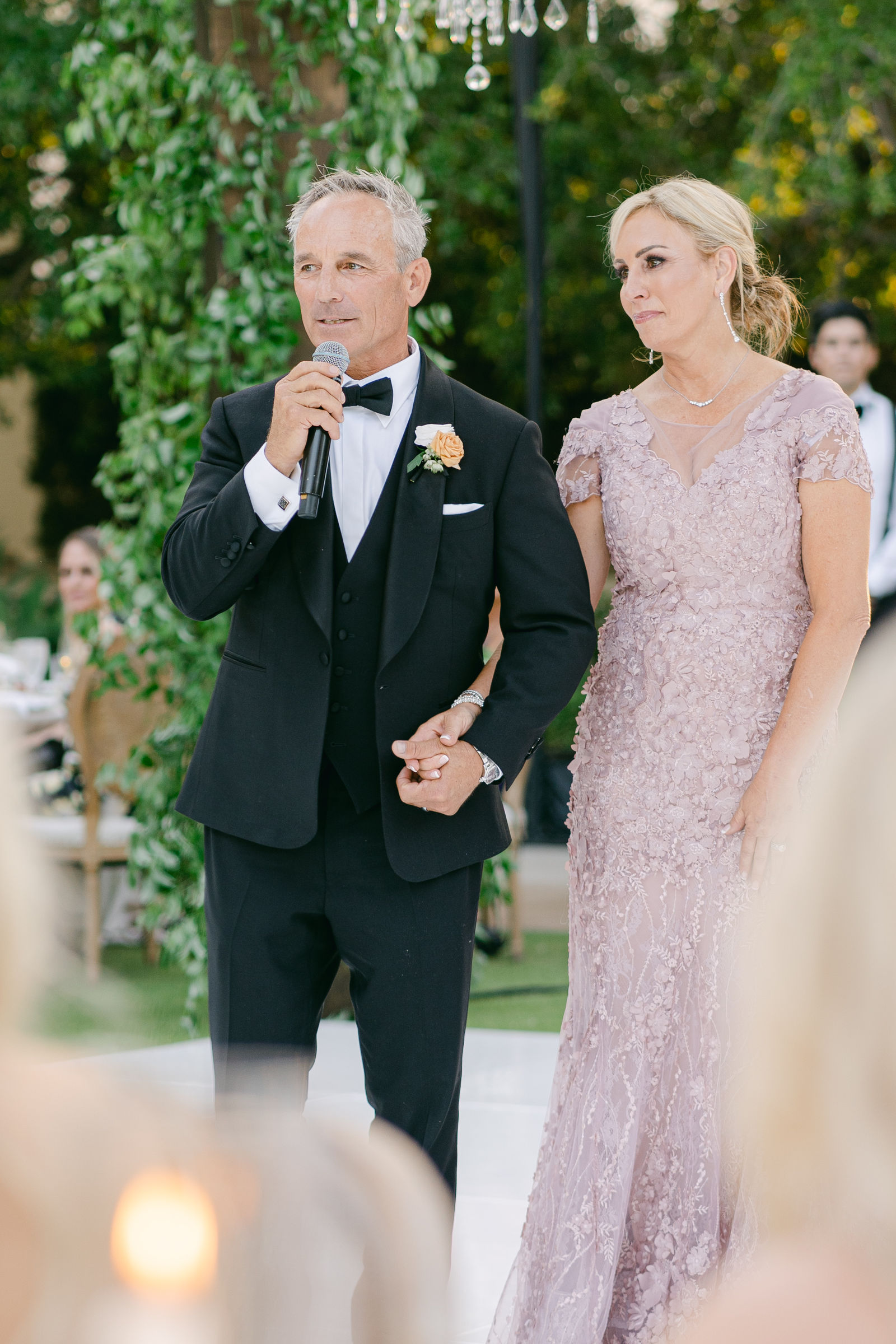 Toasts and the parents at the reception