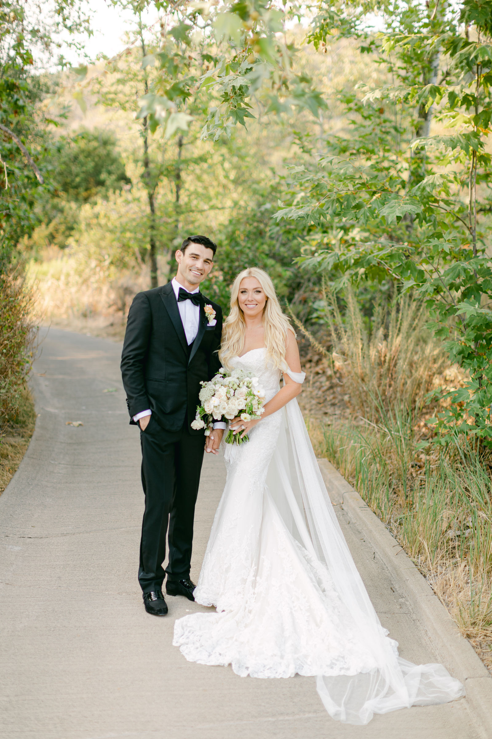 Shayna and Chance together on the path after the ceremony