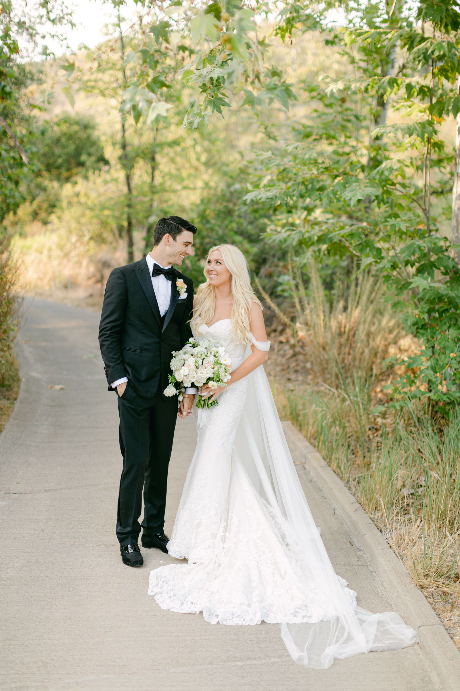 Shayna and Chance together on the path after the ceremony