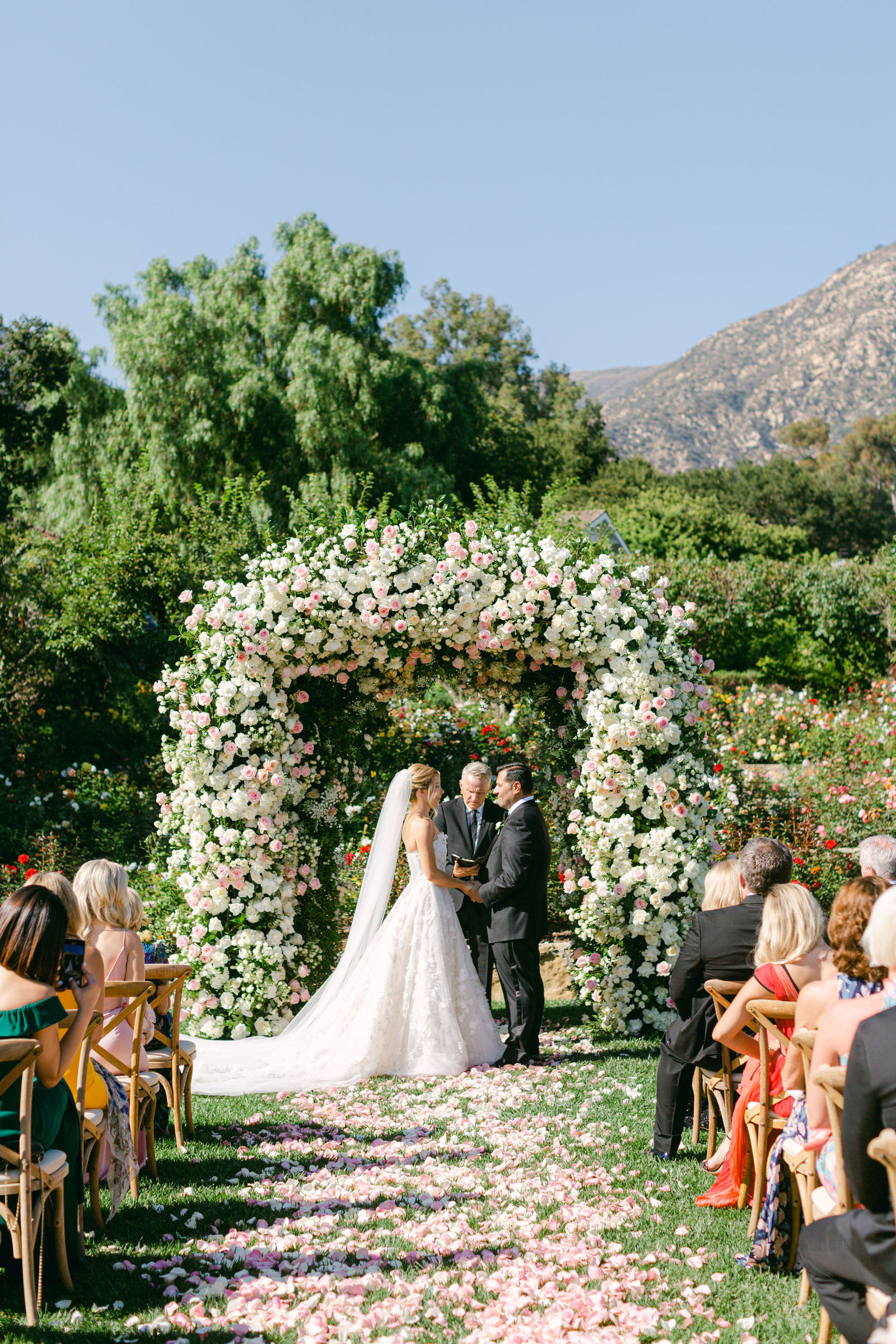 The kiss beneath the rose arch at San Ysidro Ranch