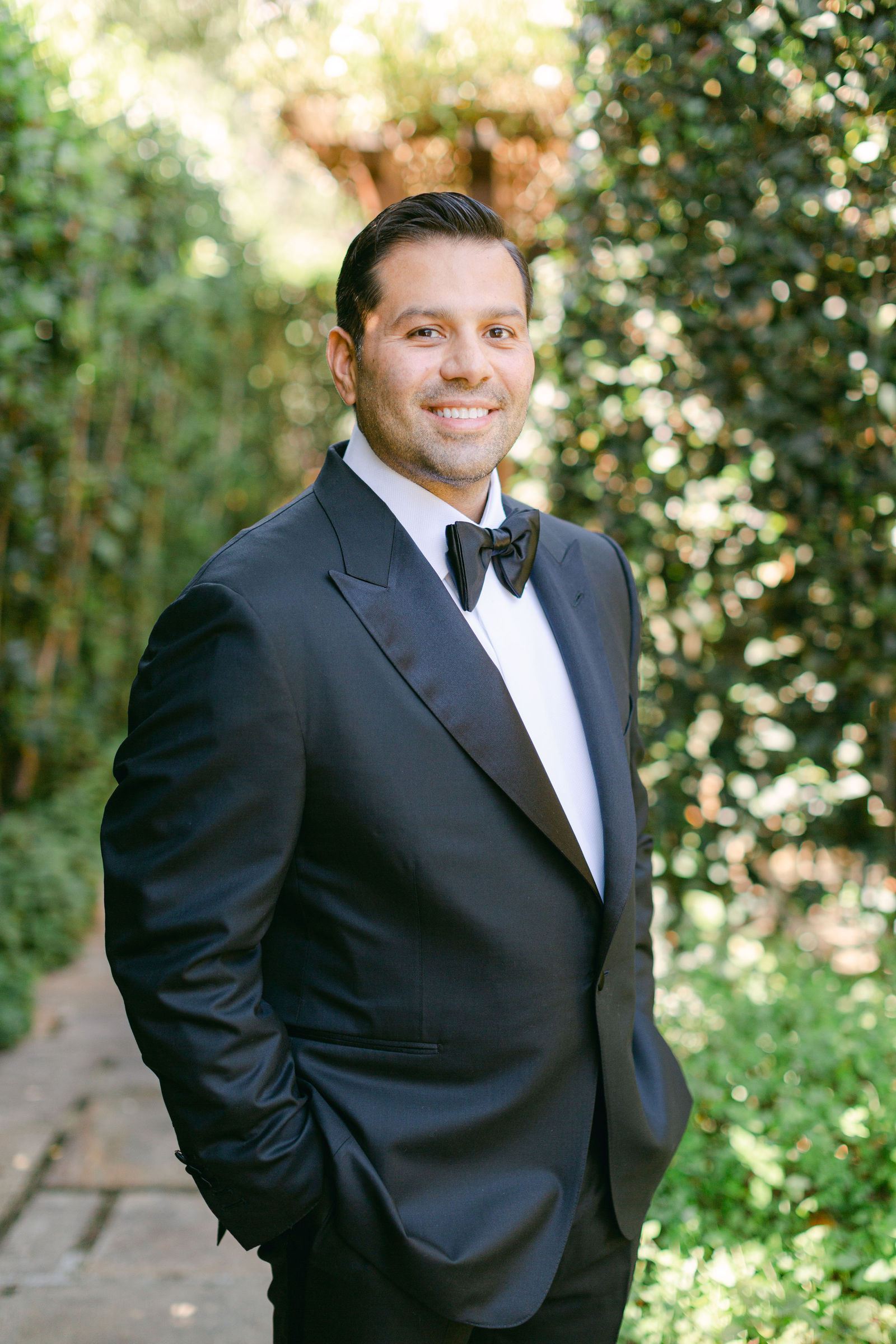 Marc in black tie in the gardens