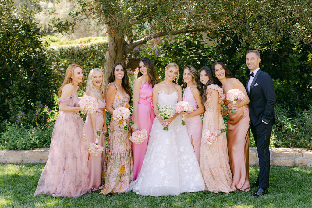 Bridesmaids in mixed blush gowns