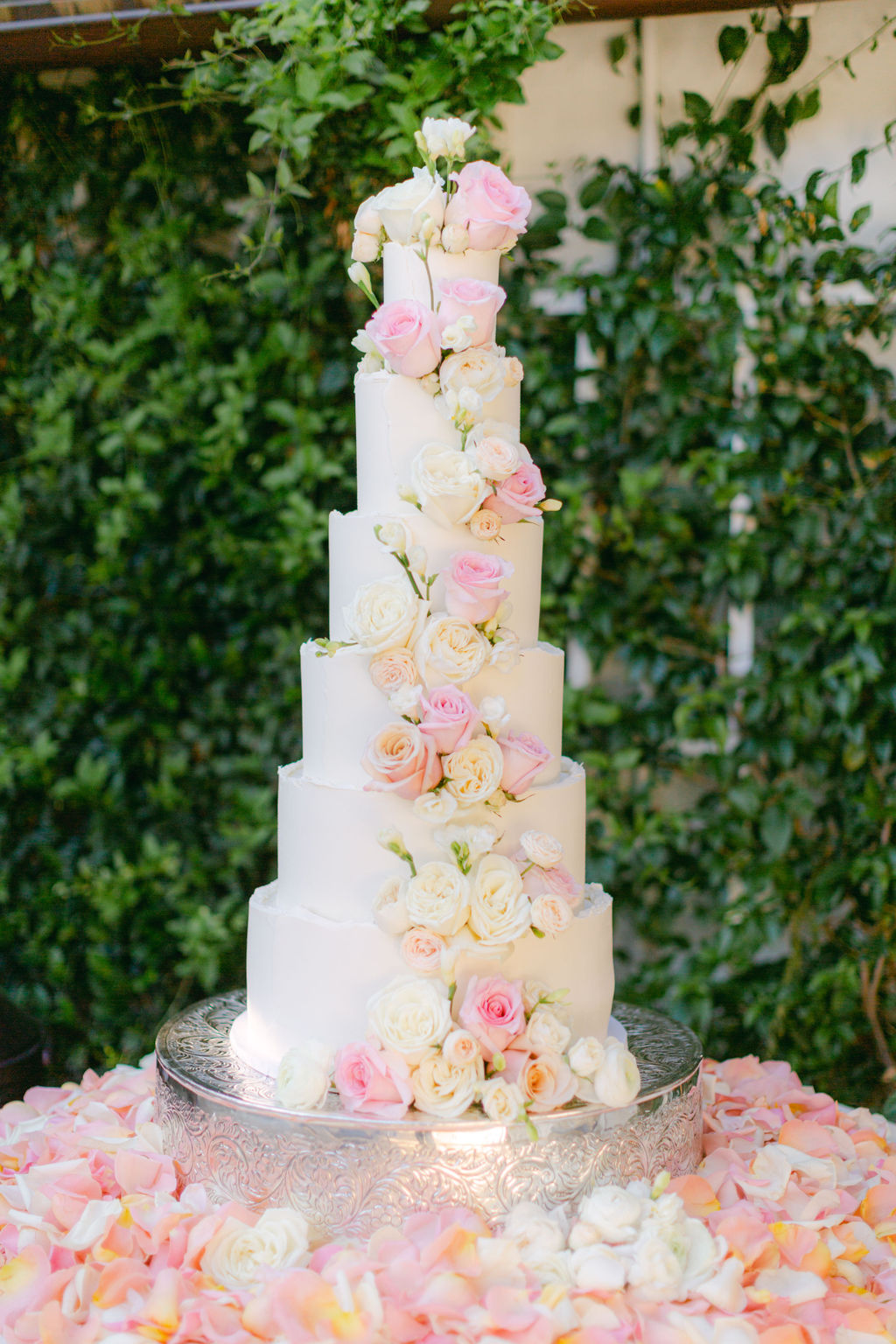 The petal-covered wedding cake