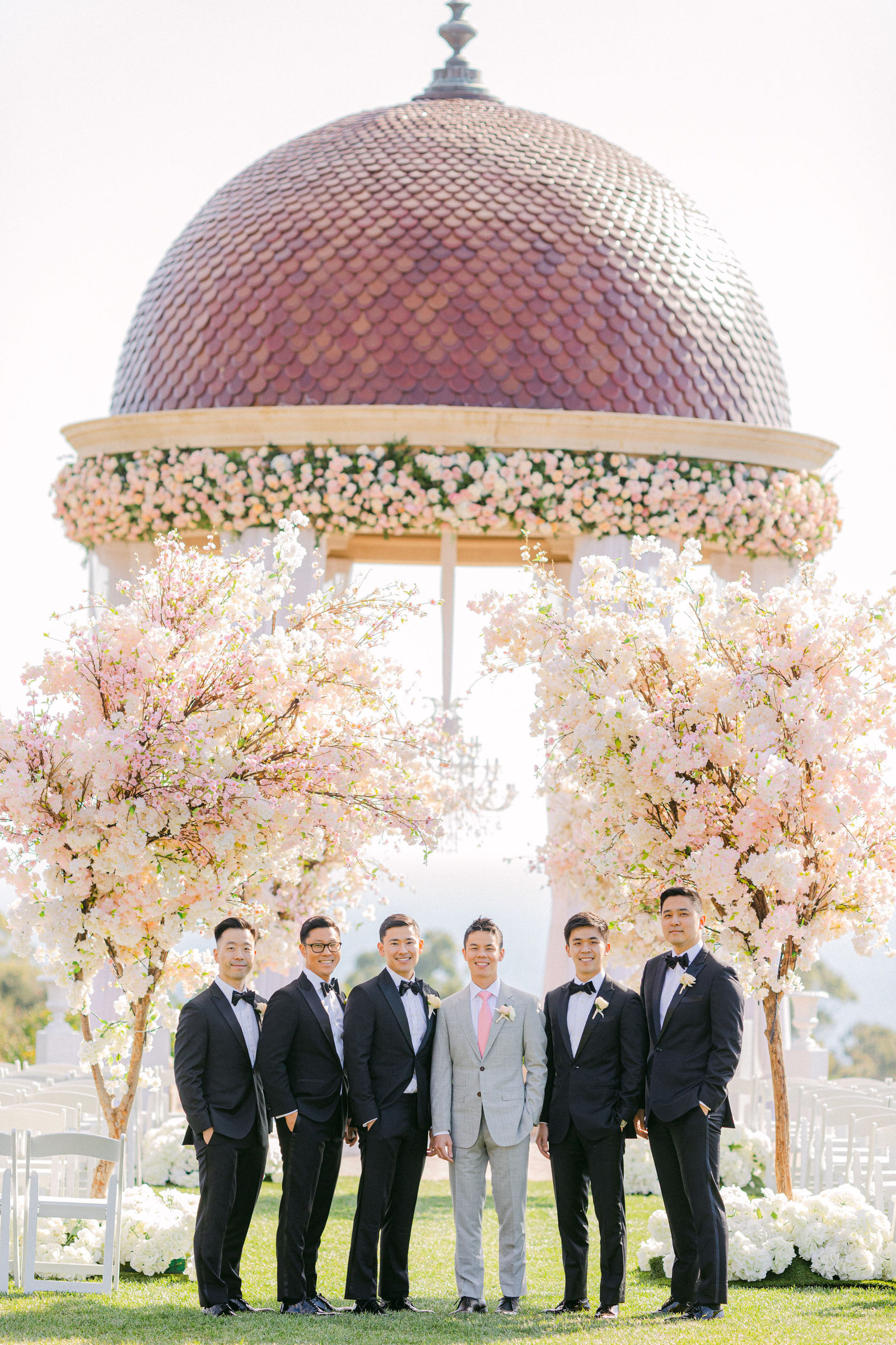 The groom and his groomsmen beneath the rotunda