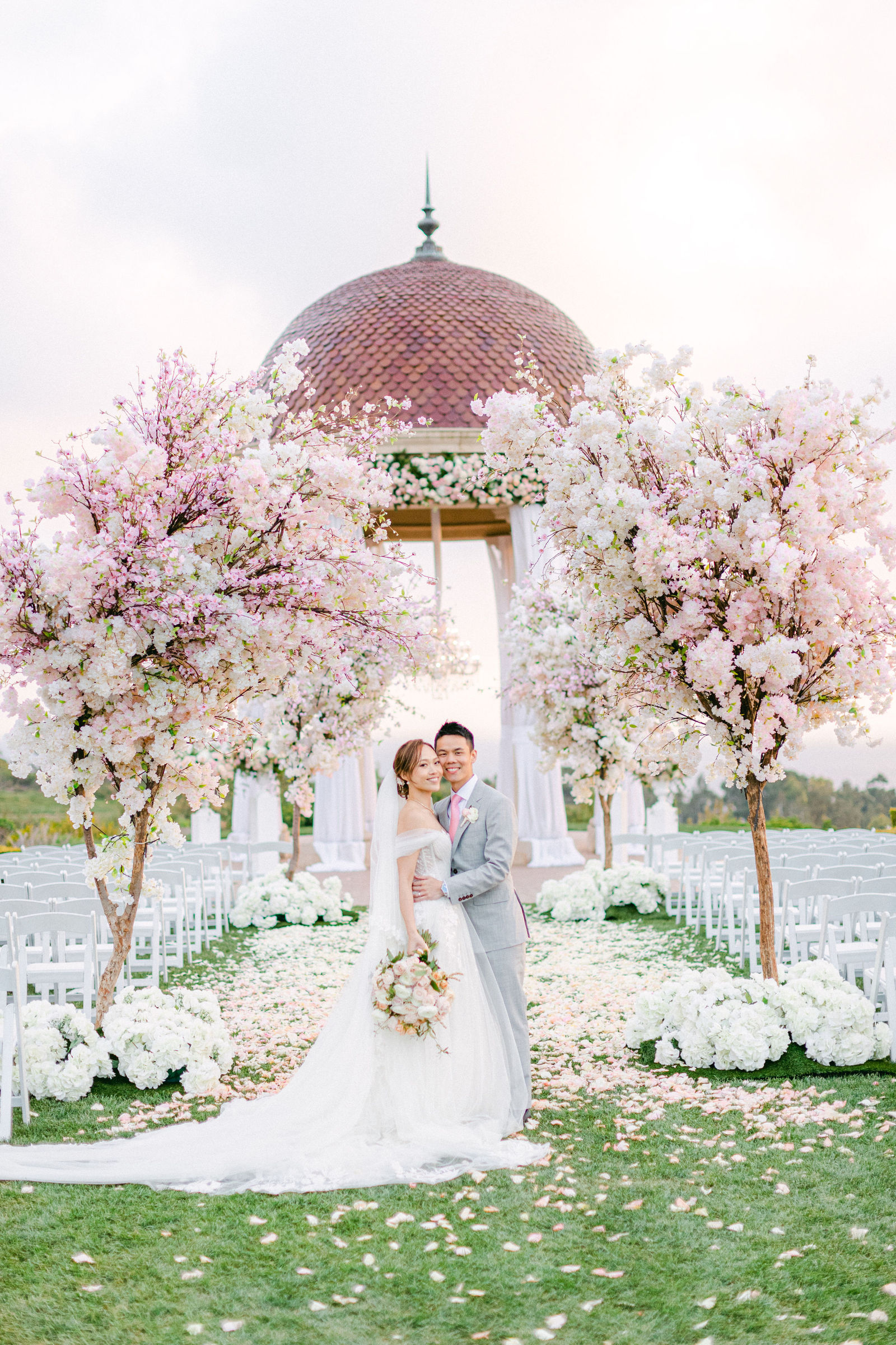 Tiffany and Keegan beneath the rotunda at Pelican Hill