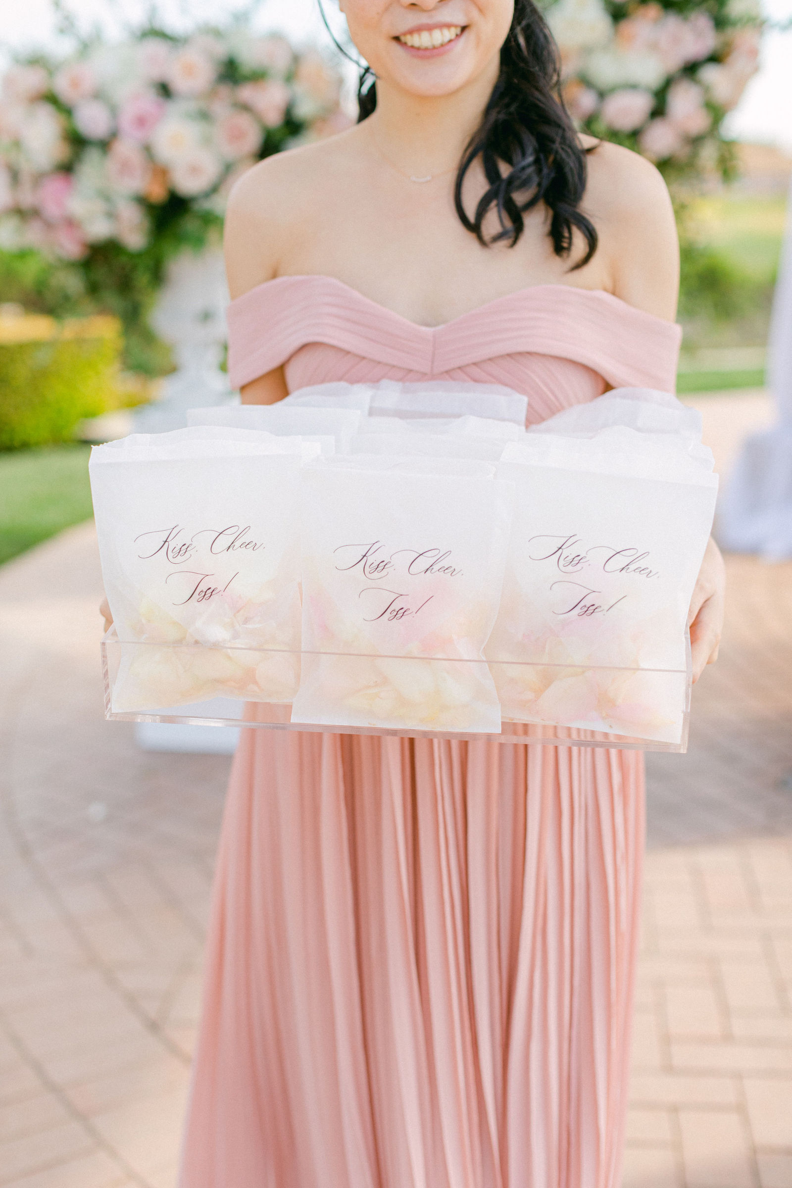 Watercolor welcome boxes tied for each guest