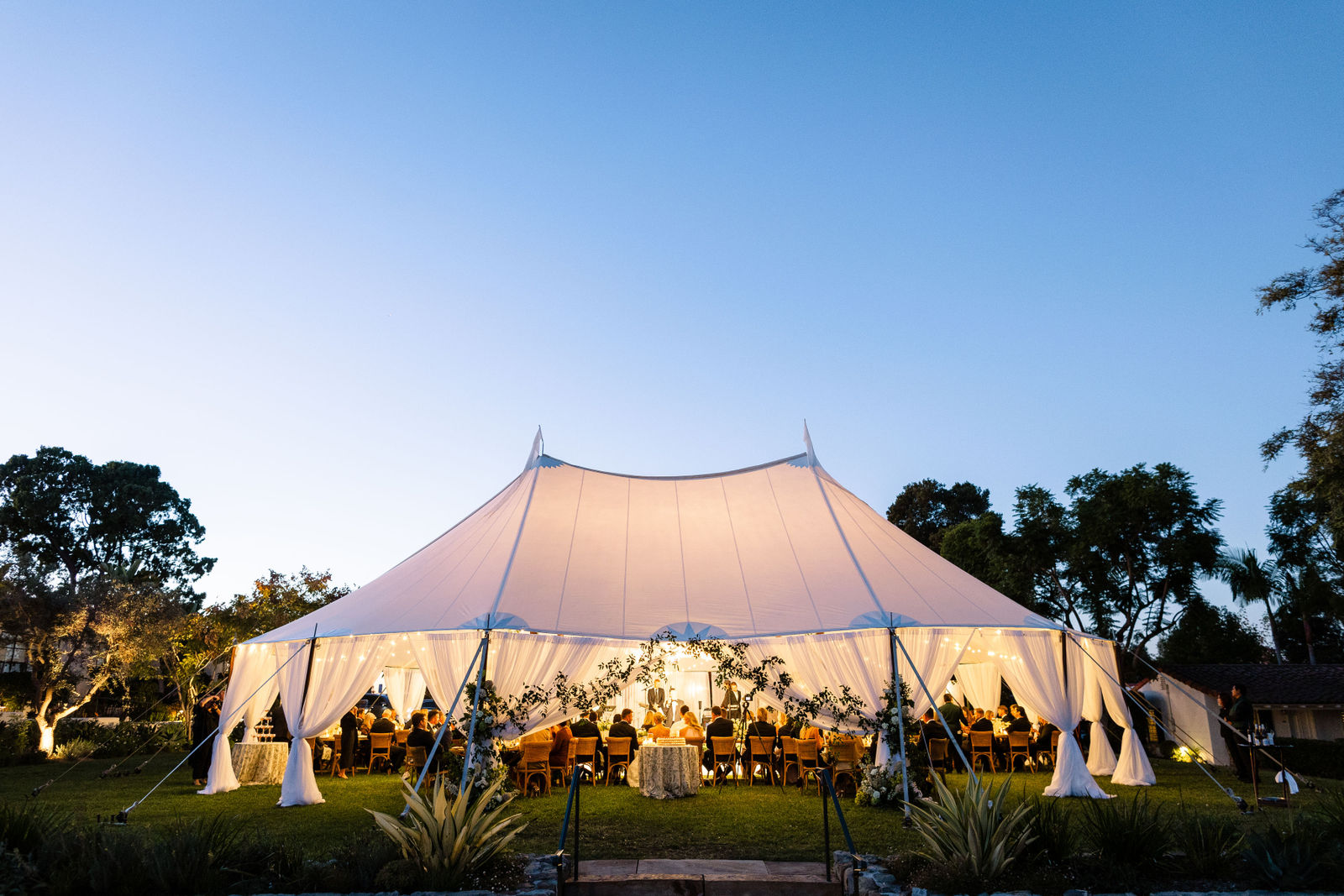 The sailcloth tent glowing at dusk at the Inn at Rancho Santa Fe